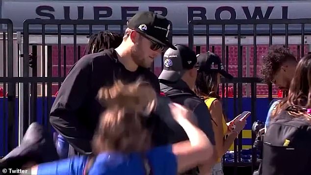 Kelly Smiley, who filmed the event, was seen in a video accidentally leaving the stage in front of the Coliseum of the Los Angeles Memorial, where the rally took place after the parade.  Quarterback Matthew Stafford is seen in black on the left side of the frame