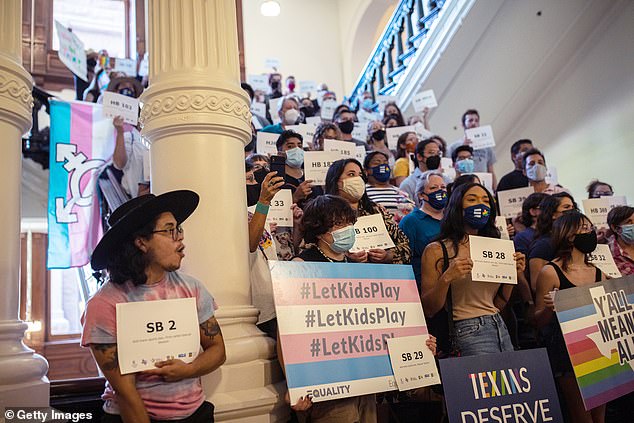 LGBTQ rights activists gather at the Texas Capitol in September to protest Republican-led efforts to pass legislation restricting transgender student athletes