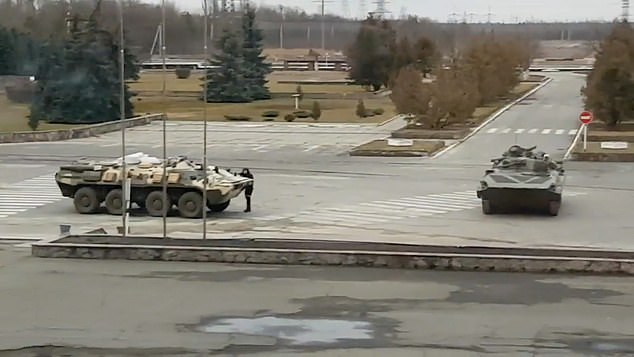 Russian armored vehicles are depicted on the roads near the Chernobyl plant, amid fears that damage to the facility could lead to a leak of radiation that will cover Europe with precipitation