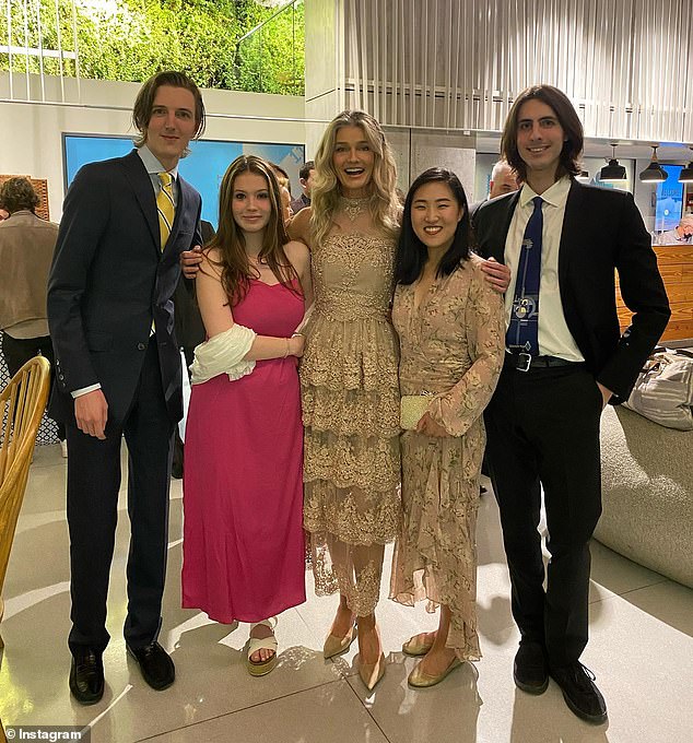 Poryzkova attends her godfather Sam's wedding in Israel on Tuesday with her sons Oliver (far left) and Jonathan (far right)