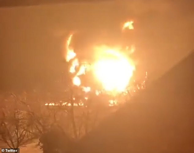 The huge explosion lit up the night sky and was caught by a Ukrainian family sheltered near their home.