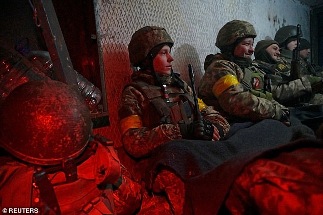 Ukrainian servicemen take refuge in combat positions at Vasilkov Military Air Base in Kyiv Oblast