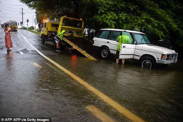 Ailsa Schofield from the Bureau of Meteorology said the Northern Rivers and mid-north coast regions of NSW could see up to 250mm of rain on Sunday (pictured, a vehicle at Coorparoo)