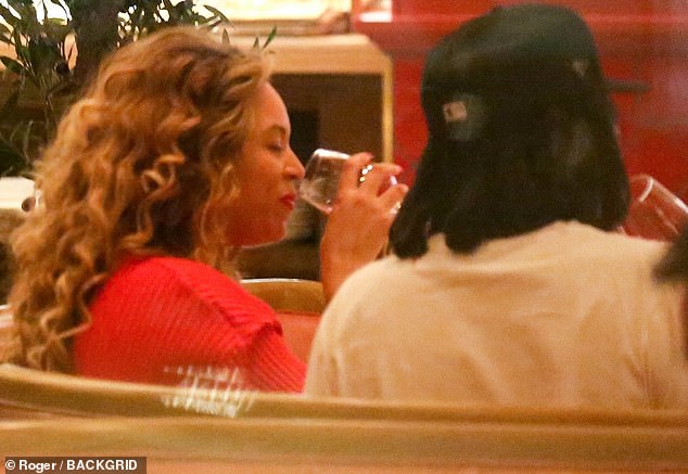 Beyonce and Jay Z look madly in love and enjoy red