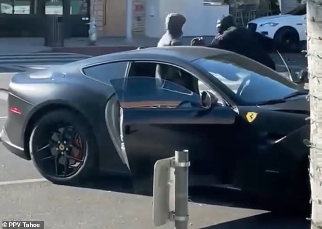 Ferrari driver beaten by two robbers trying to steal his