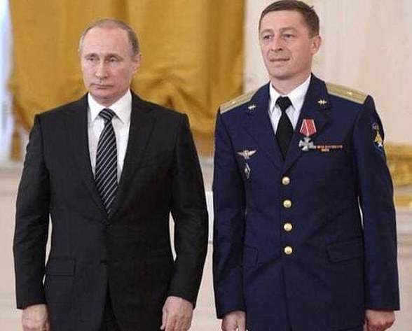 Colonel Andrei Zakharov (pictured on the right with Vladimir Putin) died in an ambush near Kiev in the early days of the war