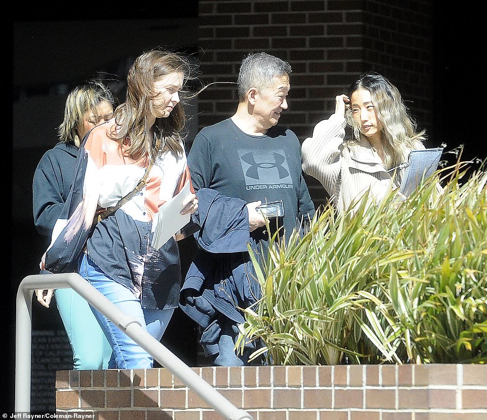 Shinn leaves Joey, an upscale restaurant in Los Angeles, with three unidentified women on March 15.