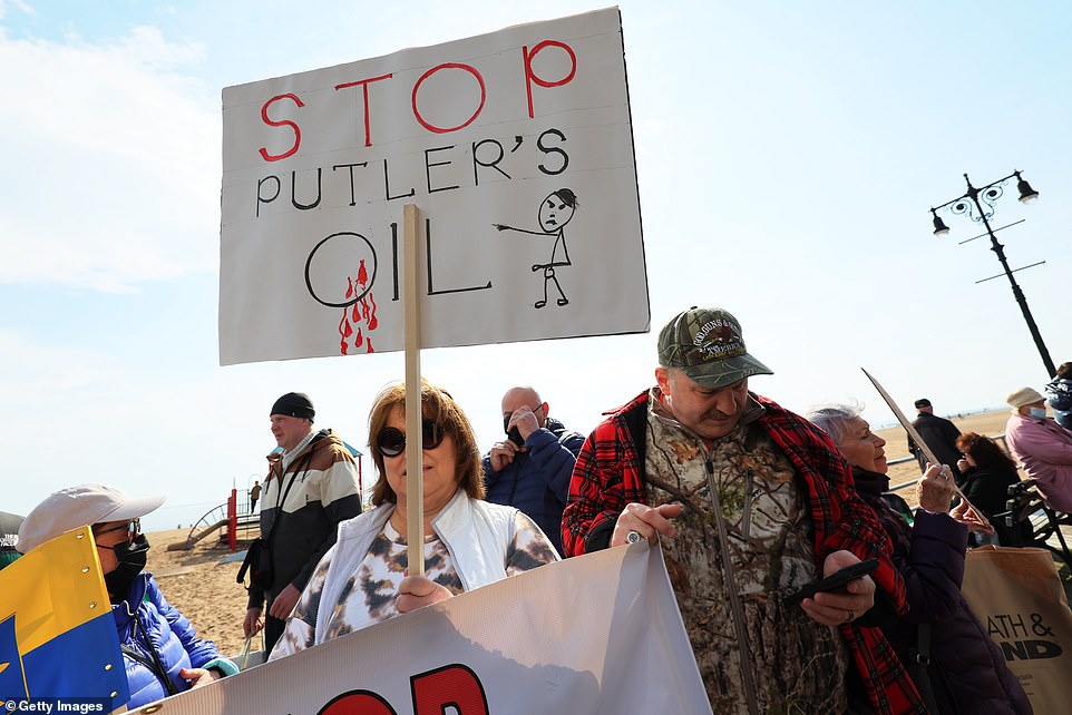 Hundreds of people gathered on the Brighton Beach boardwalk earlier this month to show support for Ukraine and call on President Biden to ban Russian oil.