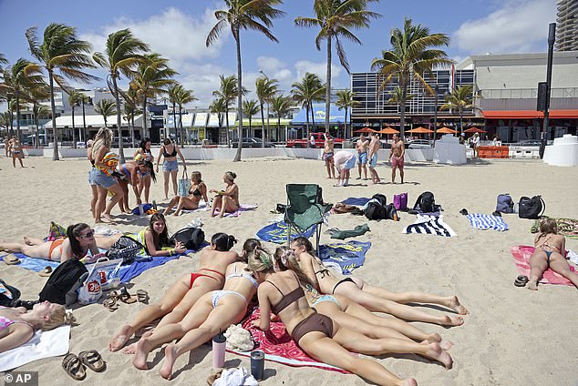 This spring break, thousands of students flocked to South Florida after a two-year delay due to Covid restrictions.  Above, students at the Fort Lauderdale beach on Tuesday.