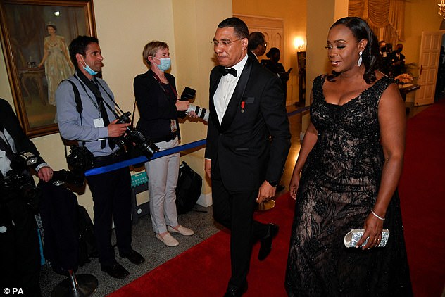 Jamaican Prime Minister Andrew Holness and his wife Juliette Holness arrived for dinner in front of the Duke and Duchess of Cambridge.