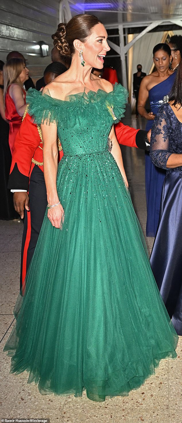 Kate wore a glittery tulle gown paired with priceless diamonds that the Queen lent her for the Duke's first visit to Jamaica.  She also wore the Order of the Royal Family and the Star of the GCVO.