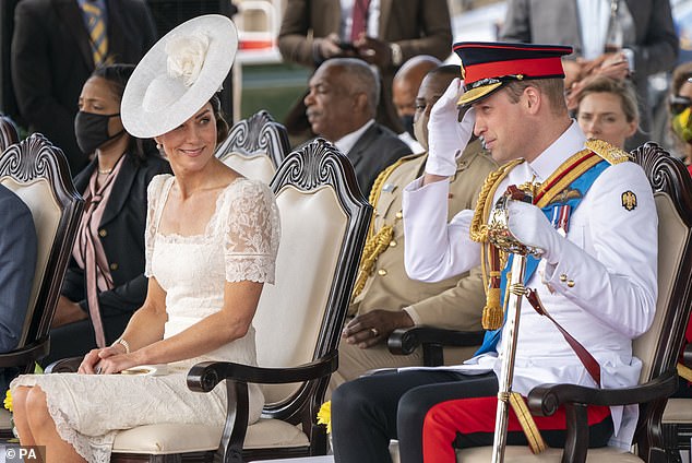 The Duke and Duchess of Cambridge take part in a parade for military personnel from across the Caribbean who have recently completed the Caribbean Military Academy officer training program.