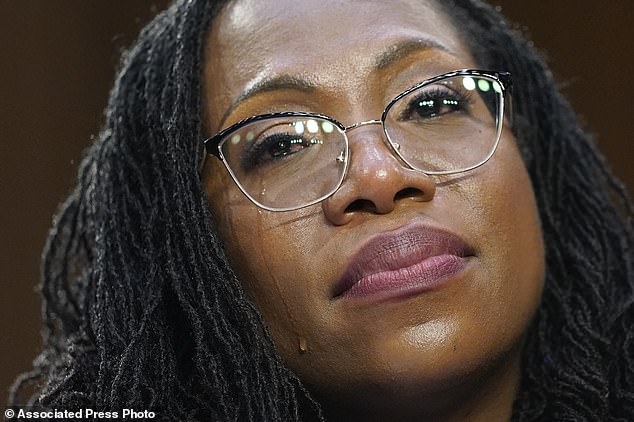 A tear rolls down the cheek of Supreme Court nominee Ketanji Brown Jackson during her confirmation hearing before the Senate Judiciary Committee on Capitol Hill in Washington.