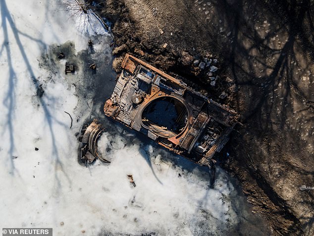 A downed Russian tank is seen during the ongoing Russian attack on Ukraine, near the town of Trostyanets, in the Sumy region, Ukraine on March 25, 2022.