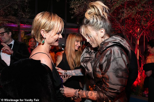 Dude: Here she was speaking to Vogue model Amber Valletta during the event