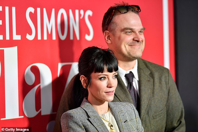 Cute couple: She was joined by her husband, Stranger Things star David Harbour, who looked chic in a green blazer