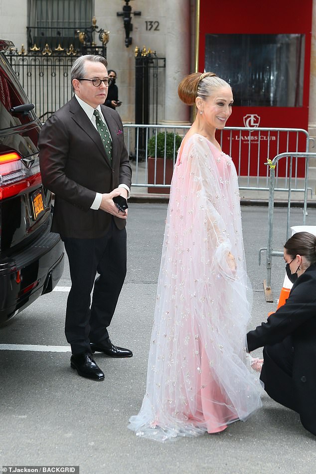 Tamed curls: Sarah Jessica let her designer dress be the star of the show as she pulled her dark blonde hair back into a tight updo created by Serge Normant