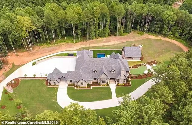 Trespasser shot rapper DaBabys 23 million North Carolina home with