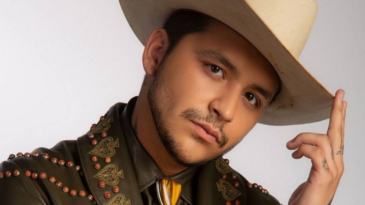 Why is Christian Nodal moving to the USA