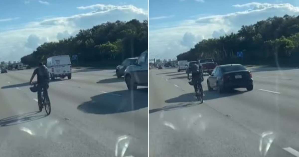 Man risks his life riding a bicycle on the Miami