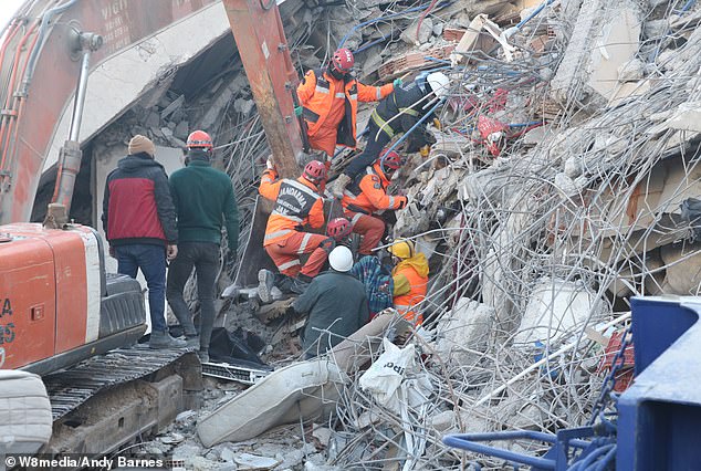 Families watching the demolition work were cared for by charity workers