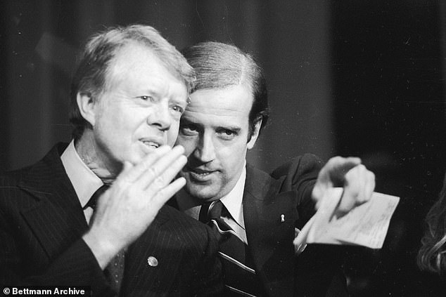 Delaware's US Senator Joseph Biden points out a friend in the crowd to President Jimmy Carter during a fundraiser in 1978 - when Biden was running for a second term as Senator