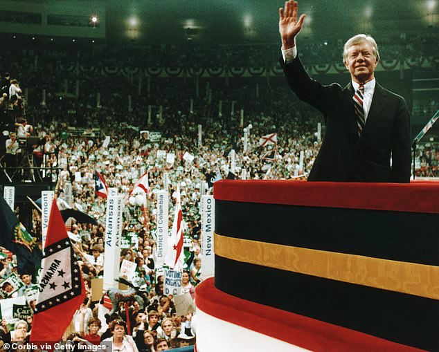 Jimmy Carter waves to the crowd on the floor at the 1980 Democratic National Convention