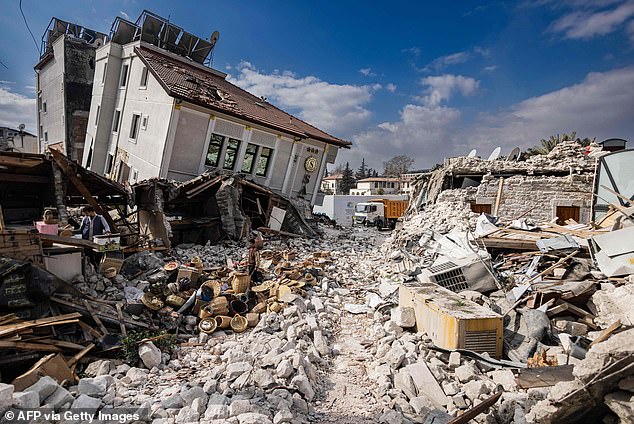 This photo shows collapsed buildings in the city of Antakya on February 19, 2023