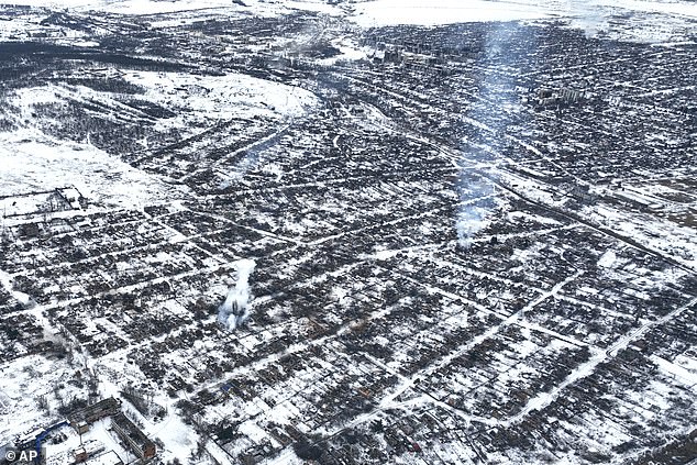 Pictured: An aerial view of the city of Bakhmut (February 14) in eastern Ukraine, which was almost completely destroyed as Kiev's soldiers fought to defend it from Russian invaders