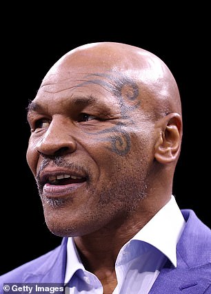 : Former boxer Mike Tyson looks on ahead of the cruiserweight title fight between Jake Paul and Tommy Fury at Diriyah Arena