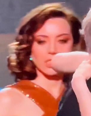 Video from the awards show shows the moment Aubrey almost got an elbow on the cheek as her co-star Meghann Fahy was about to hug Michael Imperioli