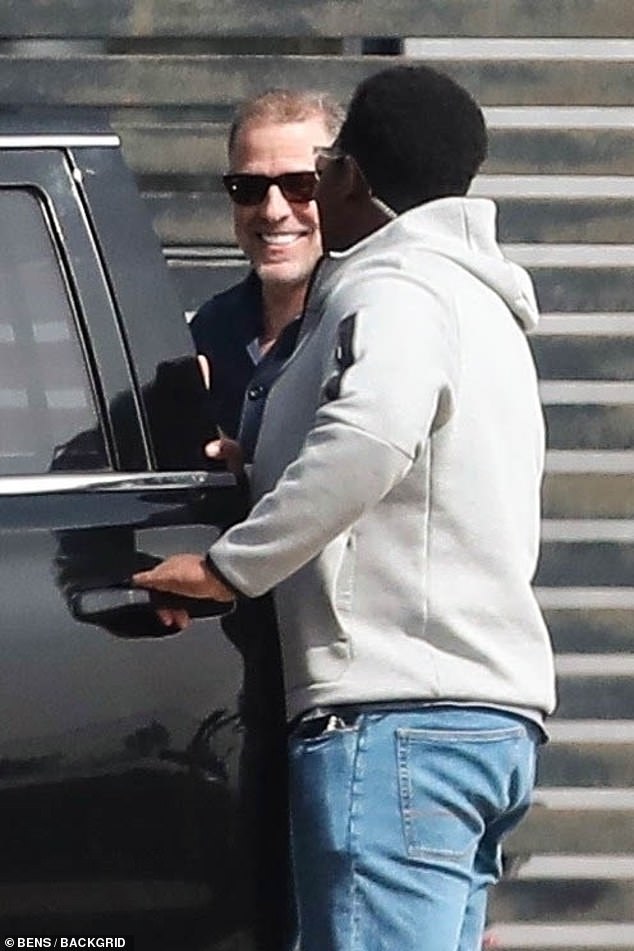 Hunter Biden flashes his veneers while shopping in Malibu with