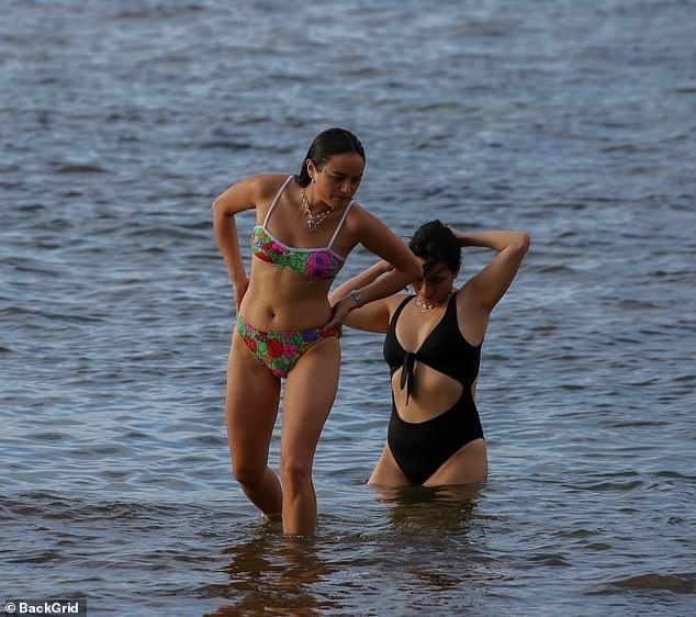 Back on Shore: After enjoying the clear waters, the ladies were spotted making their way back to shore