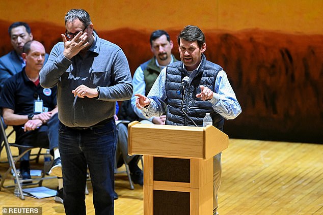 A railroad representative, Darrell Wilson (pictured on the stand), said they were ready to start removing contaminated soil from under their tracks at 6am tomorrow.  It is unclear when the operation will begin.