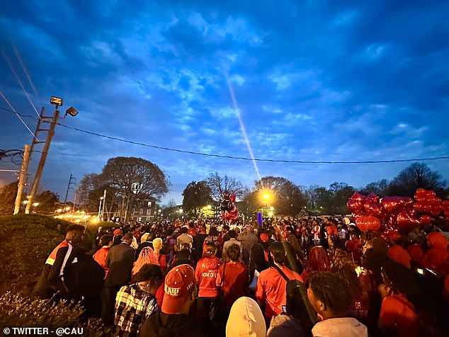 Students gathered to hold a candlelight vigil for Sterling, with a suspect in police custody