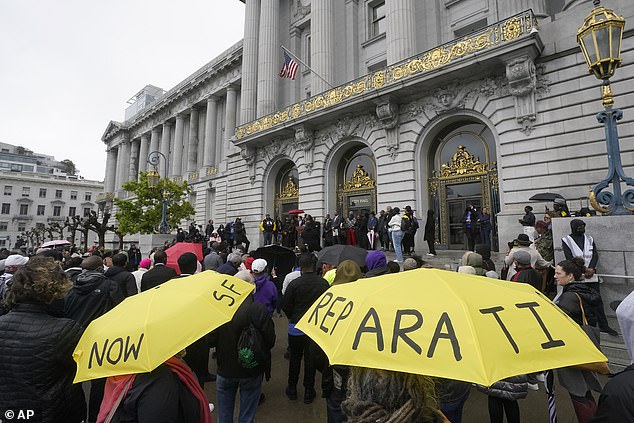 Activists demanding reparations held a rally ahead of the 3pm board meeting on Tuesday where the public could share their views