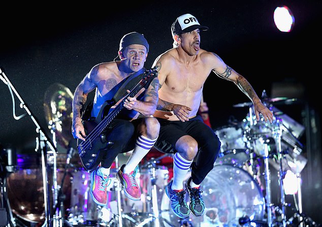 Give away?  The Red Hot Chili Peppers are currently in the midst of their Global Stadium Tour with their next stop in Vancouver, Canada on Wednesday March 29 as pictured at the 2013 Coachella