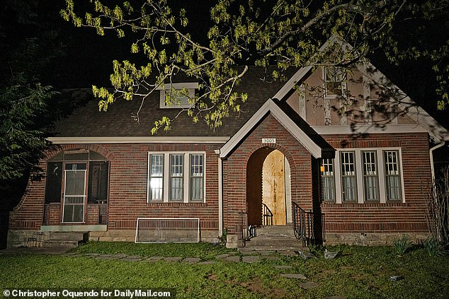 Hale's Nashville home is pictured with the front door already boarded up