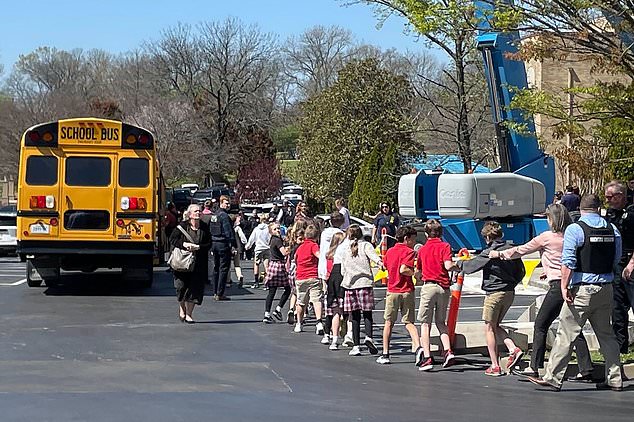 Children at Covenant School, a private Christian school in Nashville, are taken to an off-site location after the shooting