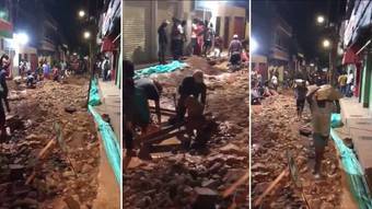 Crowd destroys road in Colombia after rumors place is full