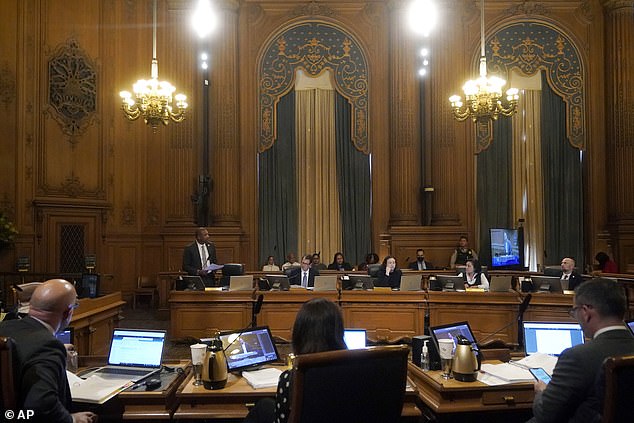 San Franciscans line up at the board meeting to sing