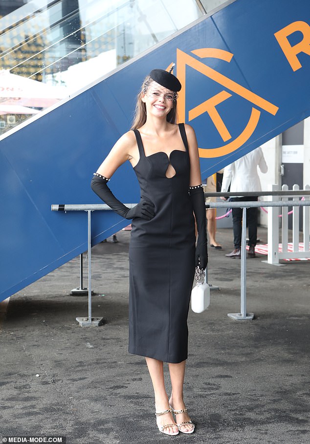 Nicole Kidman's niece Lucia Hawley, 25, (pictured) also performed at the races, wearing a classic black dress with a unique twist on the sweetheart neckline