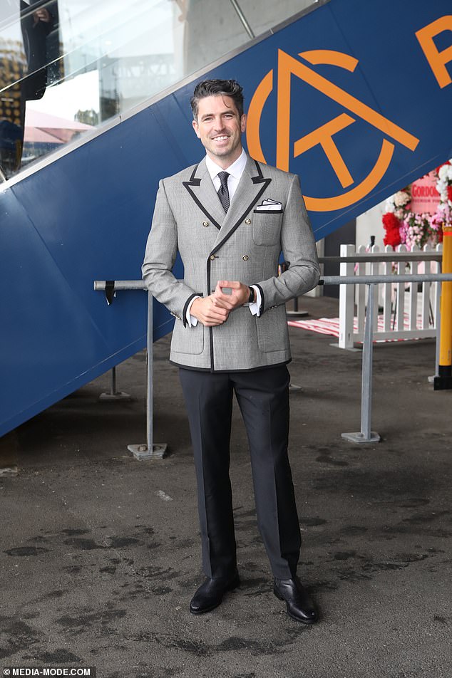 Elsewhere, Scott Tweedie, 35, (pictured) walked the 'red' carpet wearing a very smart black-trimmed double-breasted blazer over gray