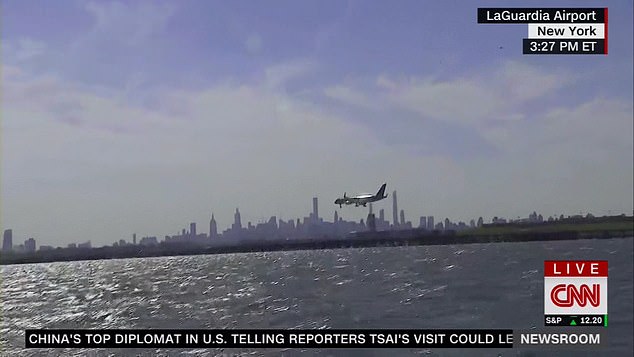 The Trump jet flew past the Manhattan skyline as it approached Manhattan