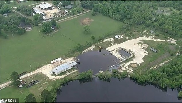 An aerial view of the sinkhole as it has grown since it reopened Sunday night