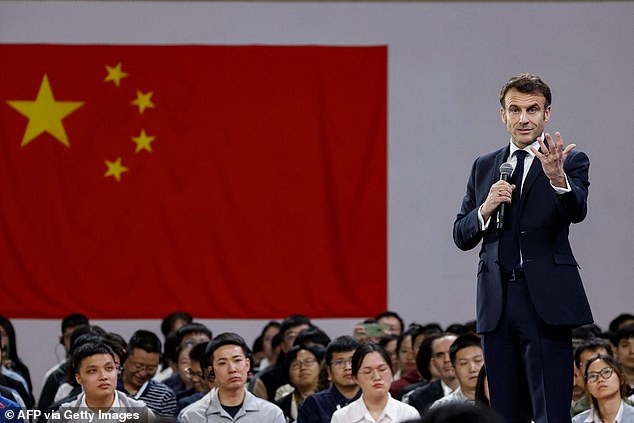 Macron gestures as he speaks to students at Sun Yat-sen University