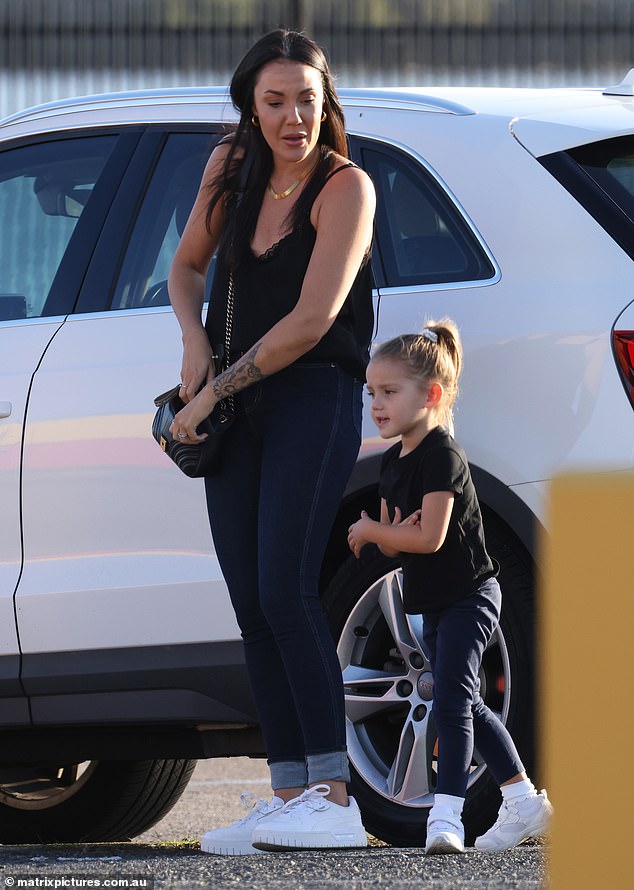 The former Married At First Sight star and her child both wore black shirts and navy blue jeans with sparkling white sneakers