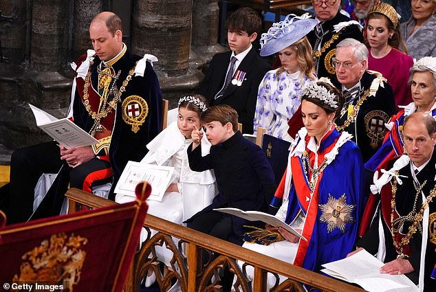 Elsewhere, the cheeky prince looked around the abbey and pointed at objects as he sat next to his older sister Princess Charlotte during the opening moments of the historic service