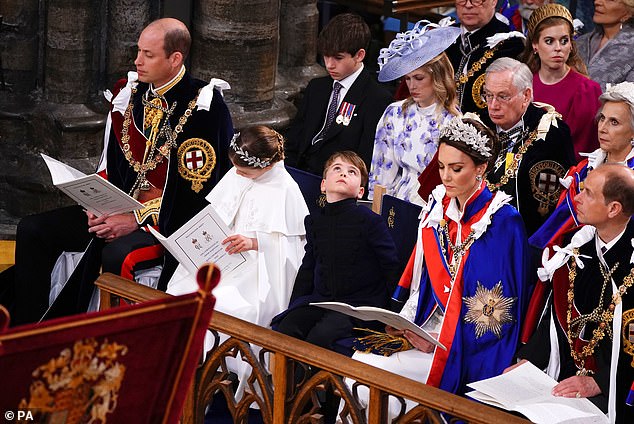 The adorable prince later slouched back in his seat, proving that the long service was too much for a five-year-old