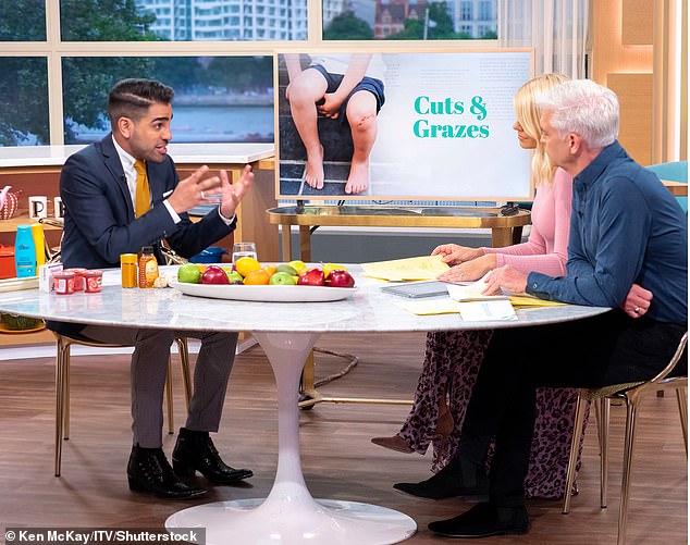 Old Times: Phillip Schofield and Holly Willoughby with Dr.  Ranj on This Morning in 2019. The TV doctor said he felt he needed to speak up